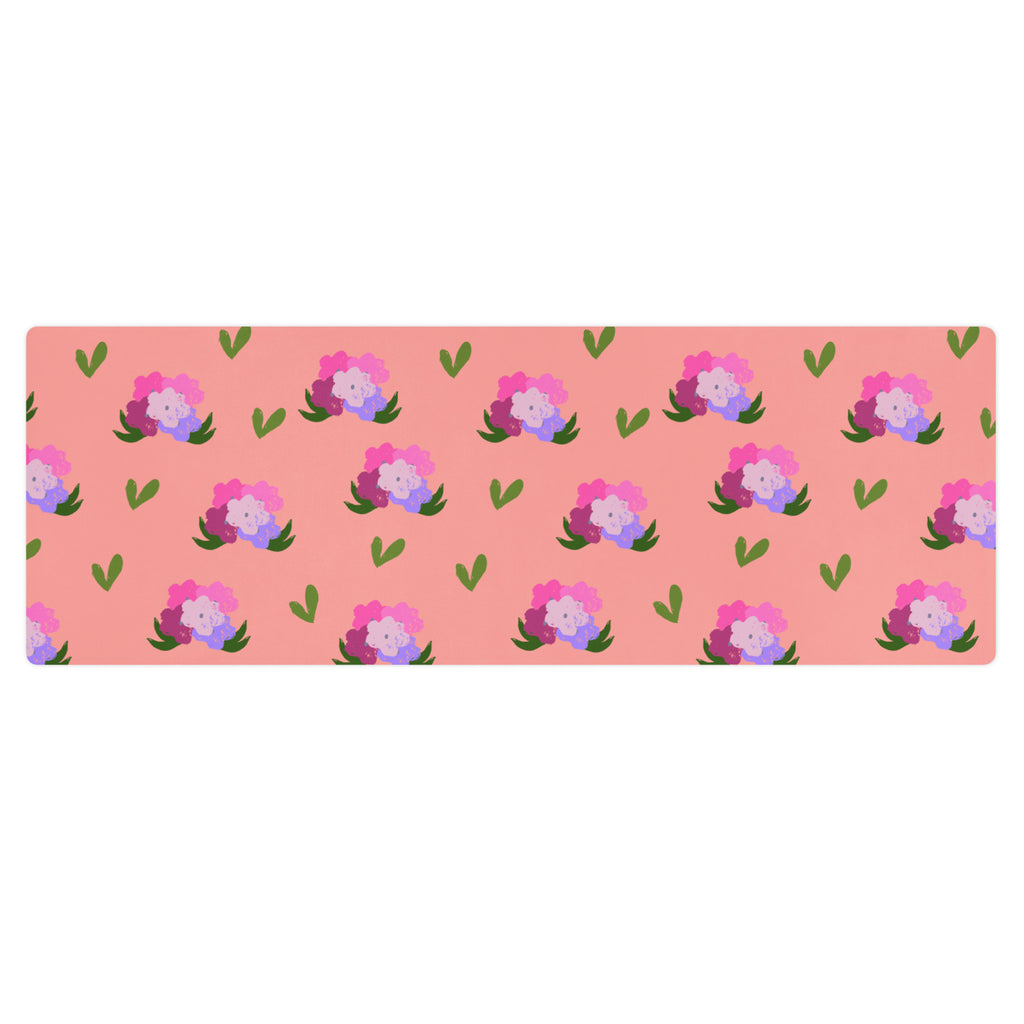 Floral bouquet print yoga mat with shades of green, pink, purple, and peach.