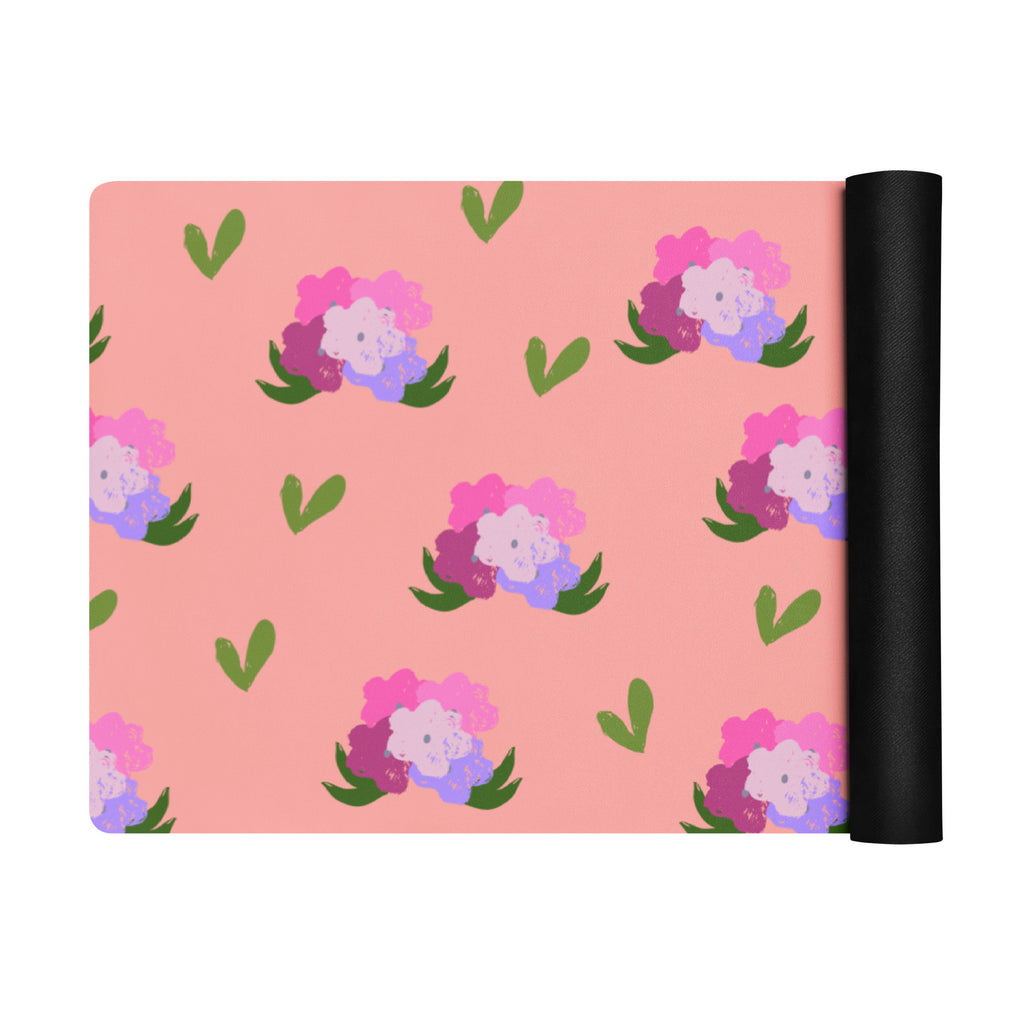Floral bouquet print yoga mat with shades of green, pink, purple, and peach.