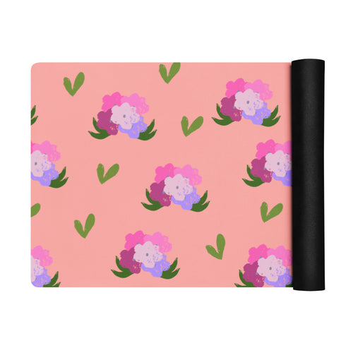 Floral bouquet print yoga mat with shades of green, pink, purple, and peach.