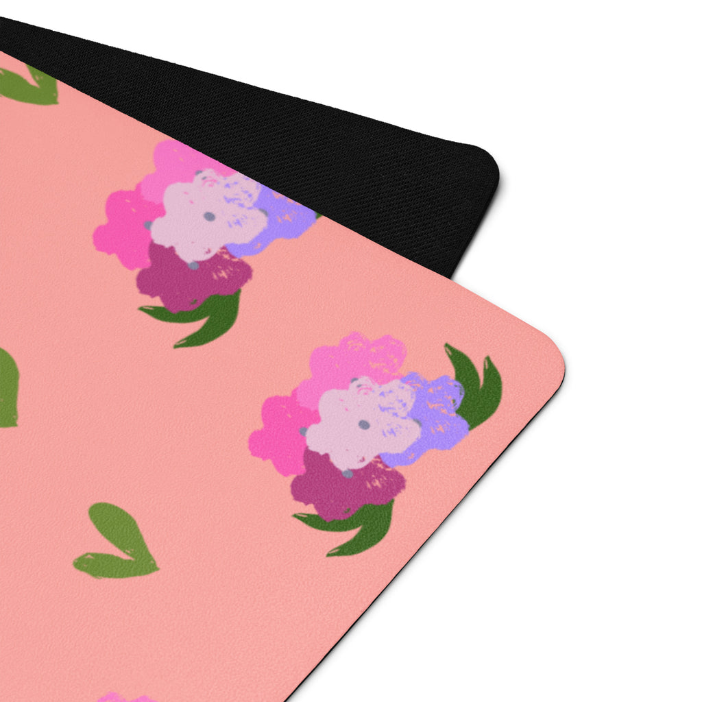 Floral bouquet print yoga mat with shades of green, pink, purple, and peach.
